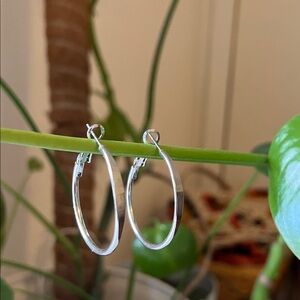 3 for $12 Classic Silver Hoop Earrings, flattened front